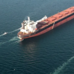 Iran US tensions Strait of Hormuz showing oil tanker shipping route crisis